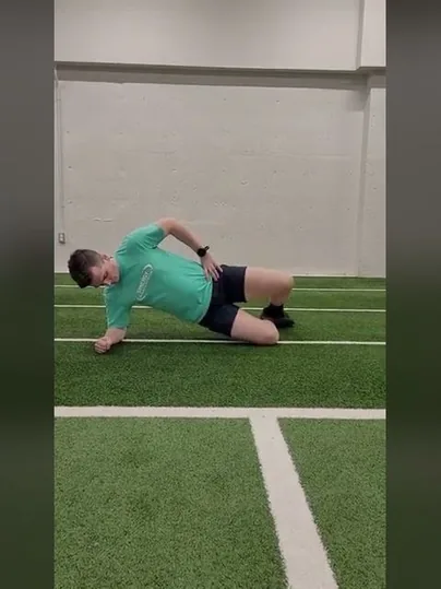 Modified Side Plank with Clamshell exercise demonstration
