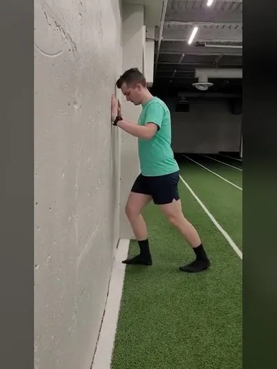 Knee to Wall Stretch exercise demonstration