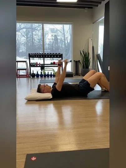 Supine Dowel Assisted Shoulder Flexion exercise demonstration