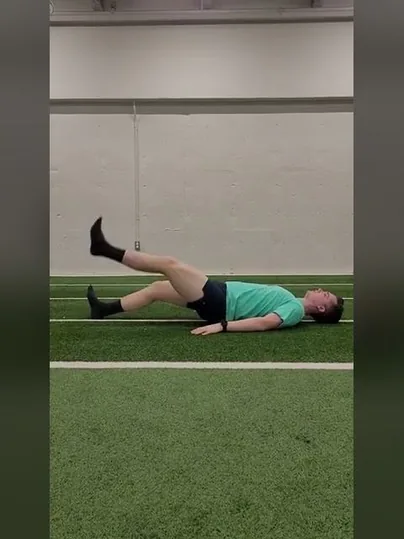 Glute Bridge Walkouts with Single Leg Raise exercise demonstration