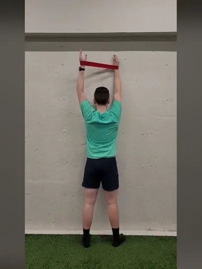 Wall Banded Shoulder Lift Off exercise demonstration