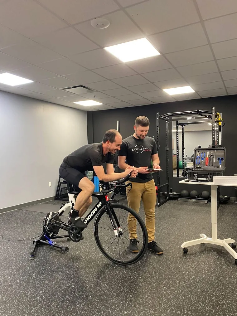 A bike fitting session in progress at Symmetrics Health
