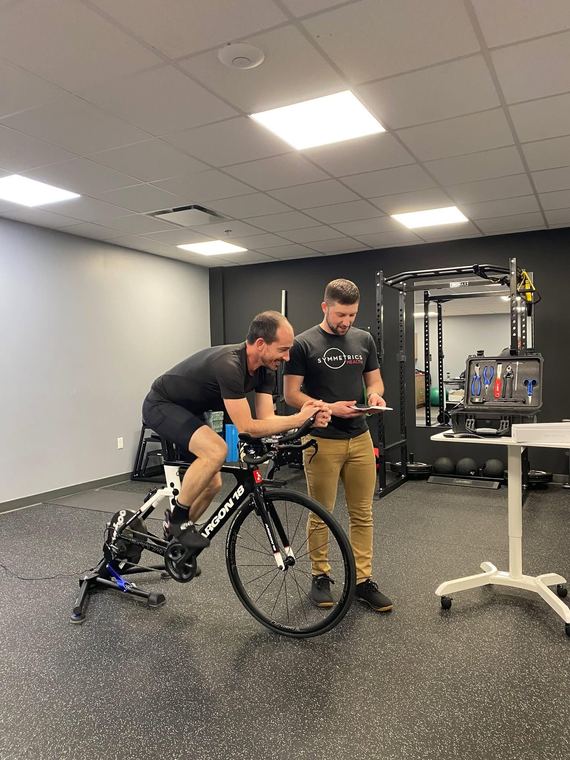 A bike fitting session in progress at Symmetrics Health
