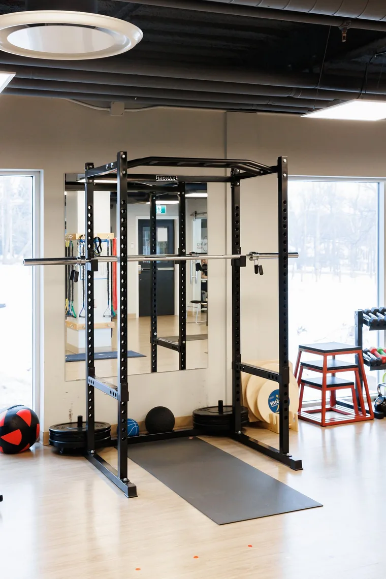 Power rack and plyometric boxes on the training floor