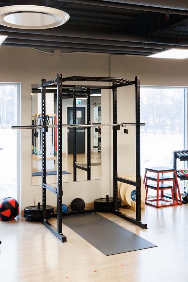 Power rack and plyometric boxes on the training floor